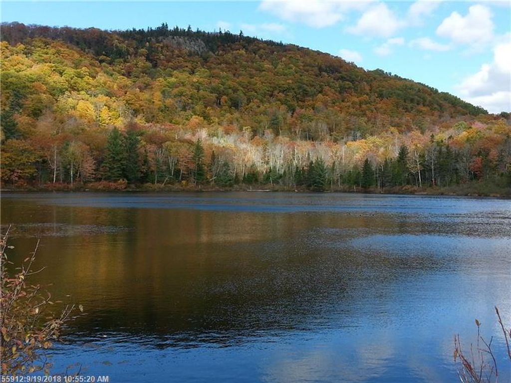 27 waterfront acres in Maine! Looks like a main house and a guest ...