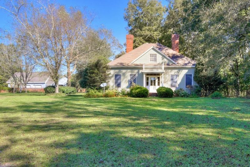 OMG! The interior! Six acres with a pond and pool in SC. 155,000