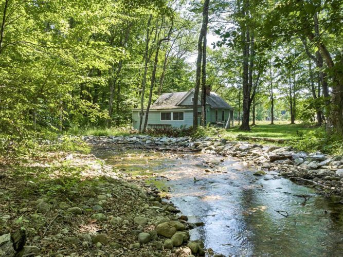 Riverfront camp in New Hampshire. Circa 1909. On one acre. 140,000