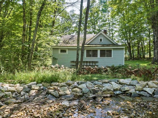 Riverfront camp in New Hampshire. Circa 1909. On one acre. 140,000