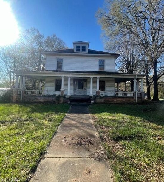 Grand staircase and pocket doors. Circa 1912 in North Carolina ...