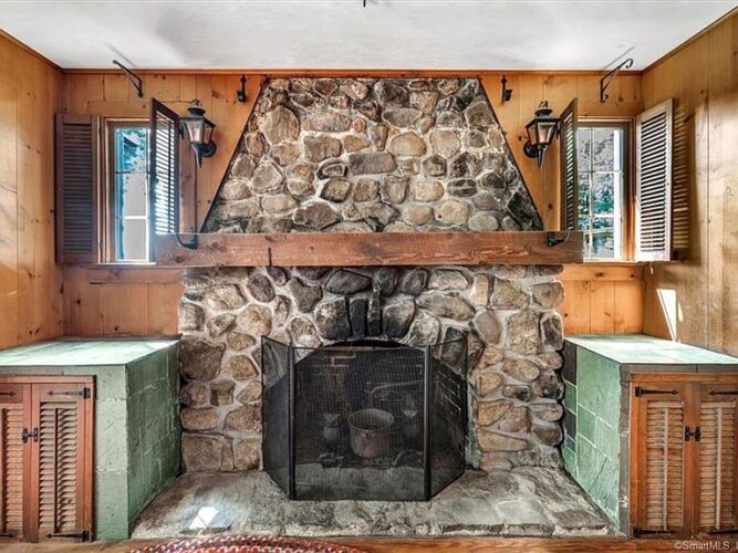 Sold for 305,000. Across the road from Lake Beseck in Connecticut