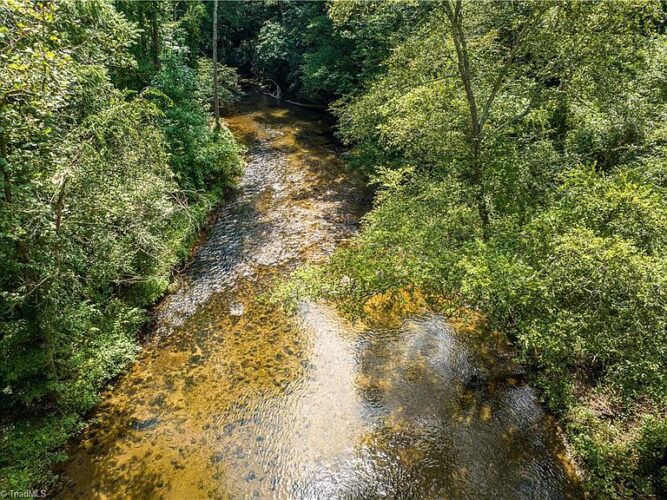 23 acre farm on the Mitchell River in North Carolina. 639,000 The